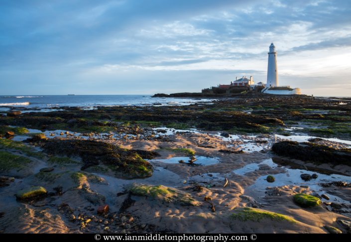 Saint Mary's Lighthouse on Saint Mary's Island, situated north of Whitley Bay, Tyne and Wear, North East England. Seen early morning from the beach beside the causeway that runs out to the island. Whitley Bay is situated just north of Newcastle.