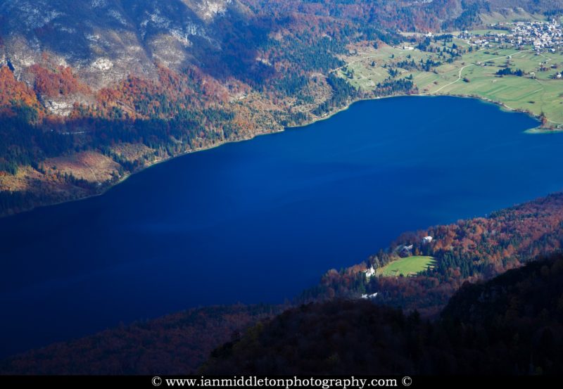 View over Bohinj Lake on an autumn day, seen from Vogel Mountain Ski Resort, Triglav National Park, Slovenia.