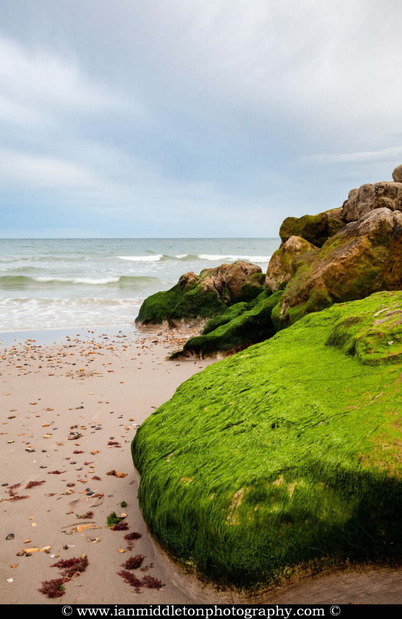 The beautiful coastal landscape at Highcliffe Beach in Dorset.
