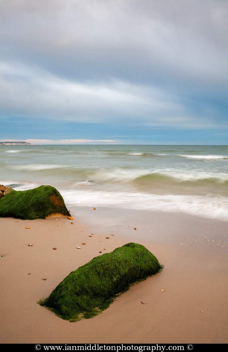 The beautiful coastal landscape at Highcliffe Beach in Dorset.
