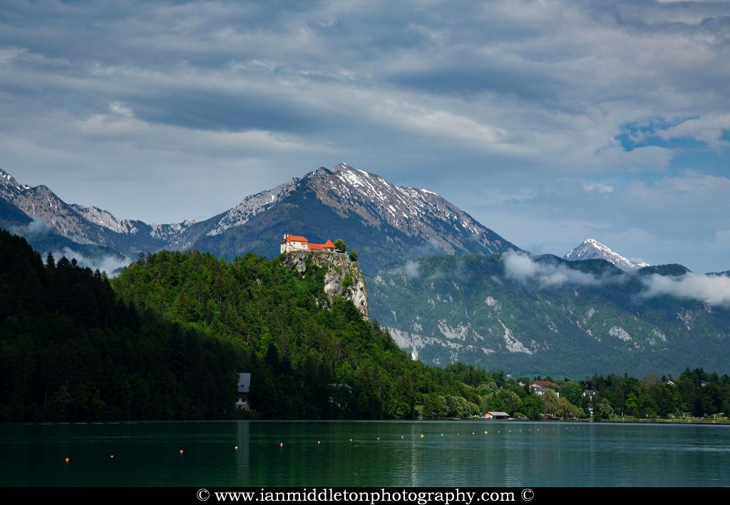 Beautiful light across the beautiful Lake Bled's hilltop castle. Slovenia.