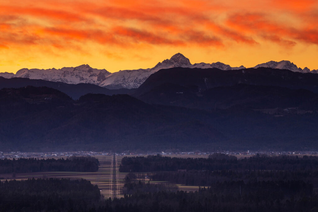 View of Mount Triglav and the Julian Alps mountains at sunset, Slovenia.