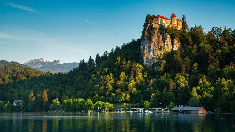 Lake Bled and the hilltop castle with the Julian Alps in the background, Slovenia