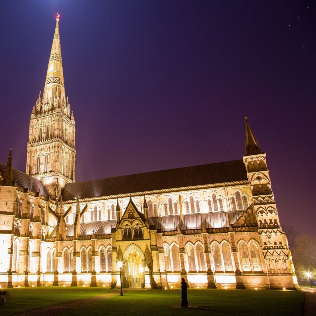 Salisbury cathedral on a moonlit evening, Wiltshire, England. Shot as the moon shone over the spire just after dusk.