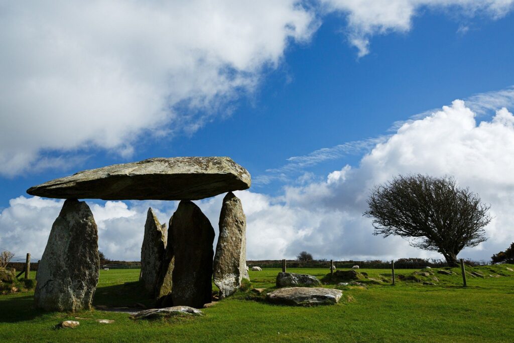 Pentre Ifan Neolithic Burial Chamber, Pembrokeshire, Wales. The Dolmen&#039;s huge capstone is delicately balanced on three uprights. Once known as Arthurs&#039; Quoit, Pentre Ifan means Ivan&#039;s Village. This monument, dating back to about 3500 BC and unusually oriented north-south, stands on the slopes of a ridge commanding extensive views over the Nevern Valley. The capstone weighs over 16 tons; it is 5m (16ft 6in) long and 2.4m (8ft) off the ground.