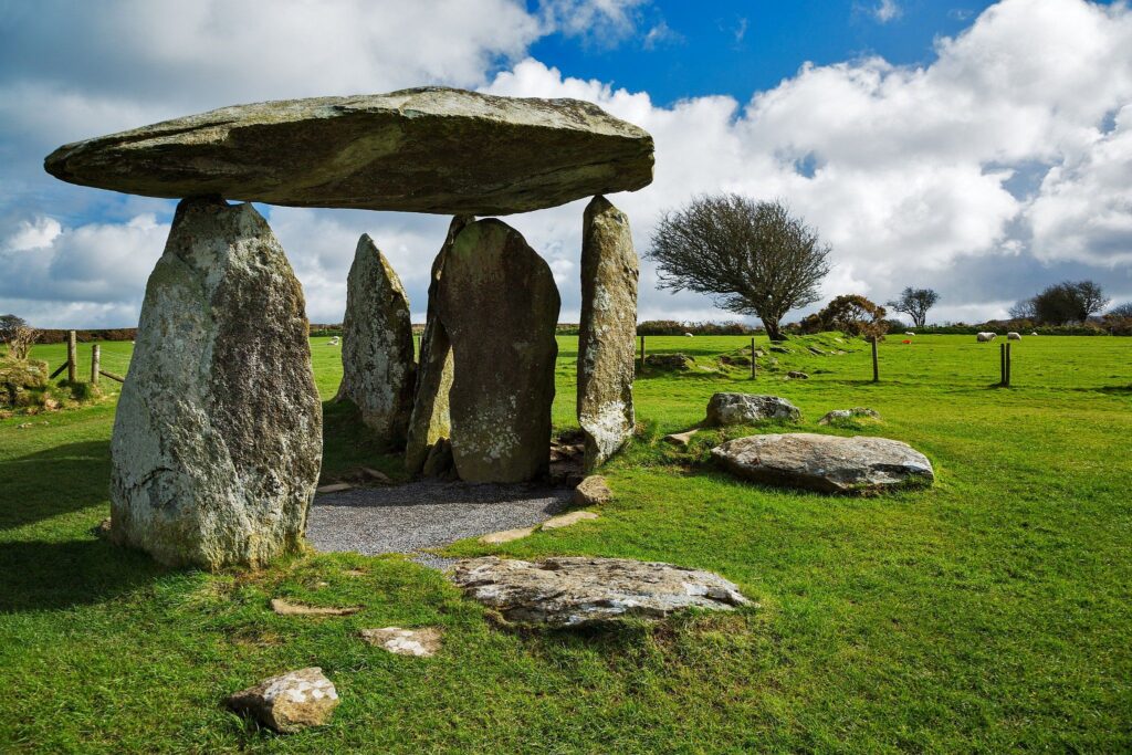 Pentre Ifan Neolithic Burial Chamber, Pembrokeshire, Wales. The Dolmen&#039;s huge capstone is delicately balanced on three uprights. Once known as Arthurs&#039; Quoit, Pentre Ifan means Ivan&#039;s Village. This monument, dating back to about 3500 BC and unusually oriented north-south, stands on the slopes of a ridge commanding extensive views over the Nevern Valley. The capstone weighs over 16 tons; it is 5m (16ft 6in) long and 2.4m (8ft) off the ground.