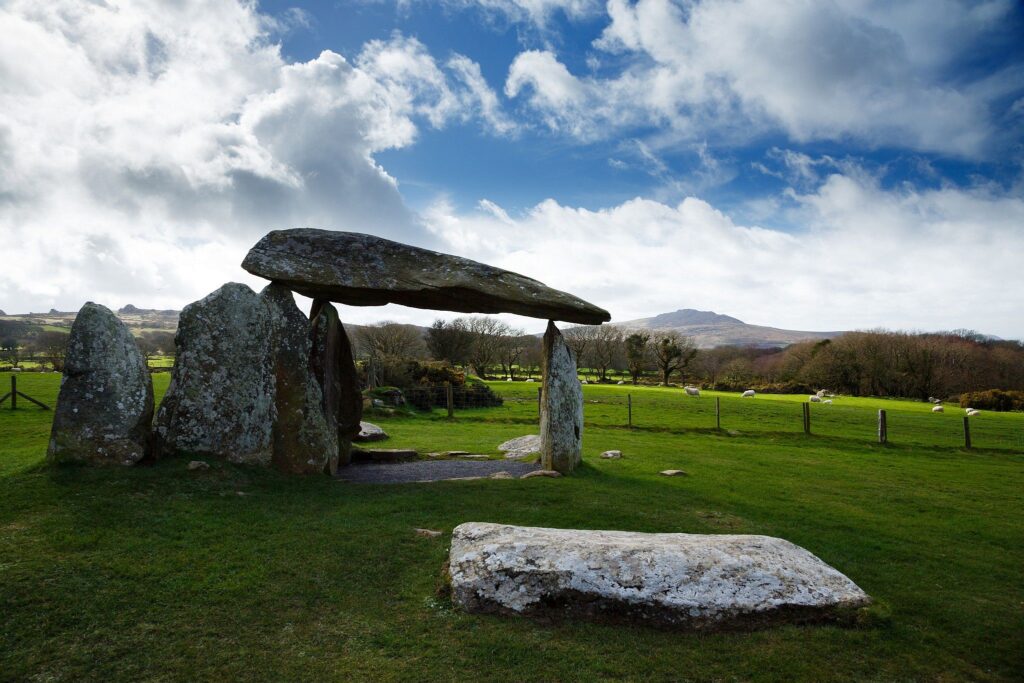 Pentre Ifan Neolithic Burial Chamber, Pembrokeshire, Wales. The Dolmen&#039;s huge capstone is delicately balanced on three uprights. Once known as Arthurs&#039; Quoit, Pentre Ifan means Ivan&#039;s Village. This monument, dating back to about 3500 BC and unusually oriented north-south, stands on the slopes of a ridge commanding extensive views over the Nevern Valley. The capstone weighs over 16 tons; it is 5m (16ft 6in) long and 2.4m (8ft) off the ground.