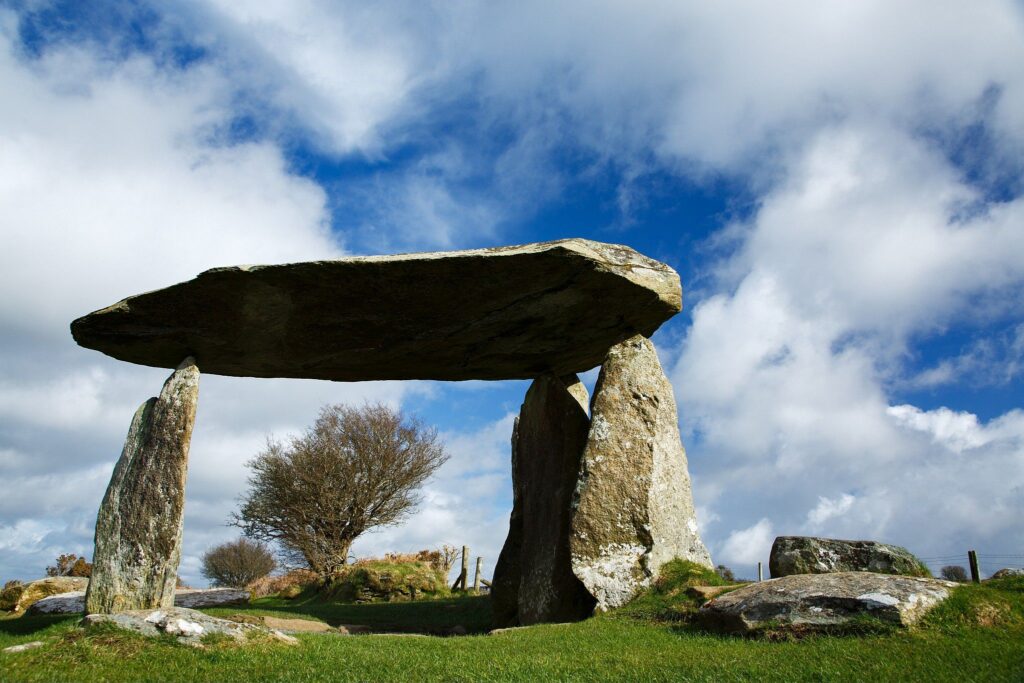 Pentre Ifan Neolithic Burial Chamber, Pembrokeshire, Wales. The Dolmen&#039;s huge capstone is delicately balanced on three uprights. Once known as Arthurs&#039; Quoit, Pentre Ifan means Ivan&#039;s Village. This monument, dating back to about 3500 BC and unusually oriented north-south, stands on the slopes of a ridge commanding extensive views over the Nevern Valley. The capstone weighs over 16 tons; it is 5m (16ft 6in) long and 2.4m (8ft) off the ground.