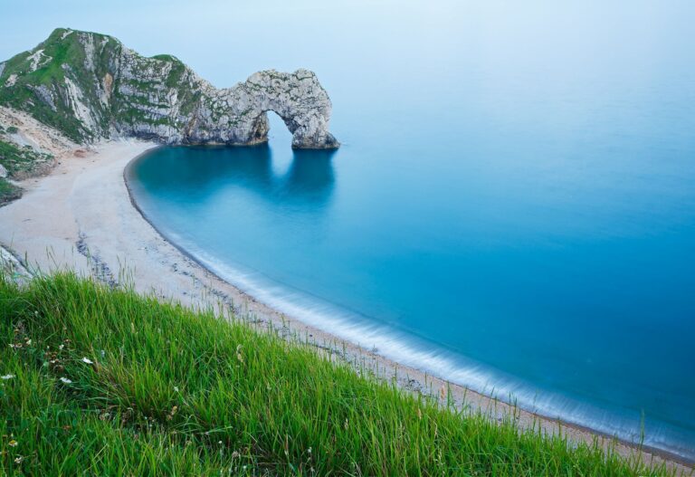 Evening view of Durdle Door beach, Dorset, England. Durdle door is one of the many stunning locations to visit on the Jurassic coast in southern England.