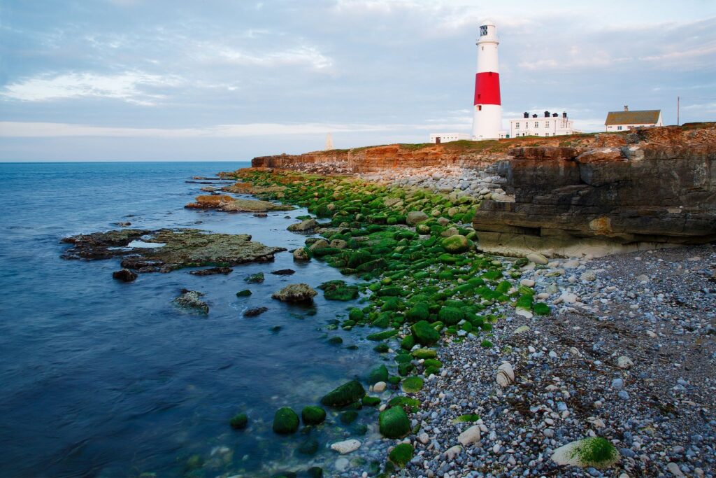 Lighthouse at Portland Bill in the early morning sun, near Weymouth, Jurassic Coast, Dorset, England.