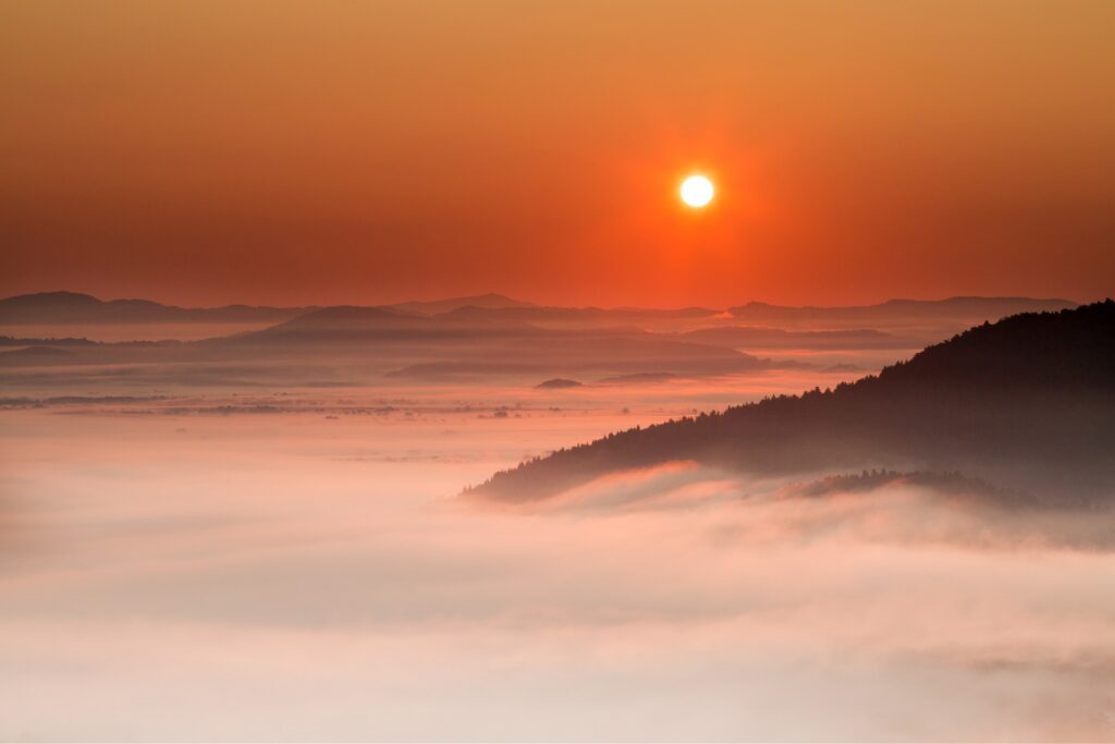 sunrise over the mist on the Ljubljana Moors (Ljubljansko Barje), a large area of wetland 160 square kilometres in size.