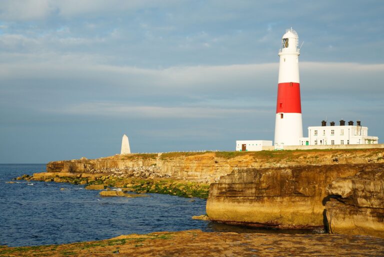 Lighthouse at Portland Bill in the early morning sun, near Weymouth, Jurassic Coast, Dorset, England.