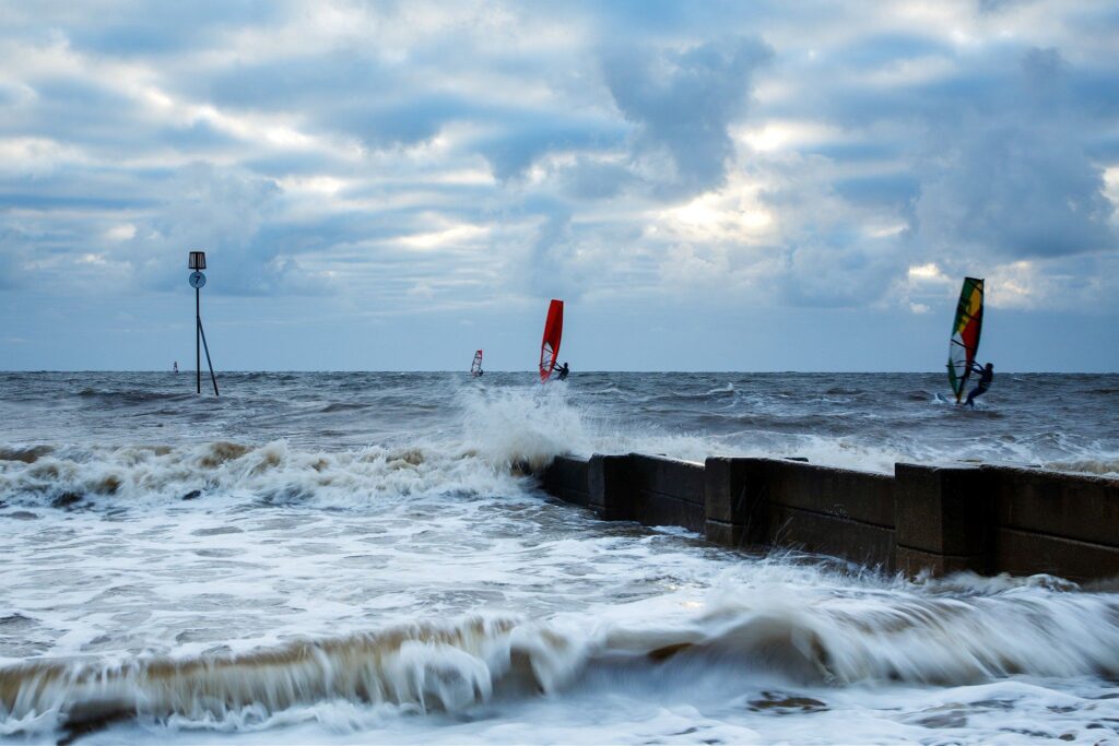 Windsurfing at Hunstanton beach, West Norfolk, England.