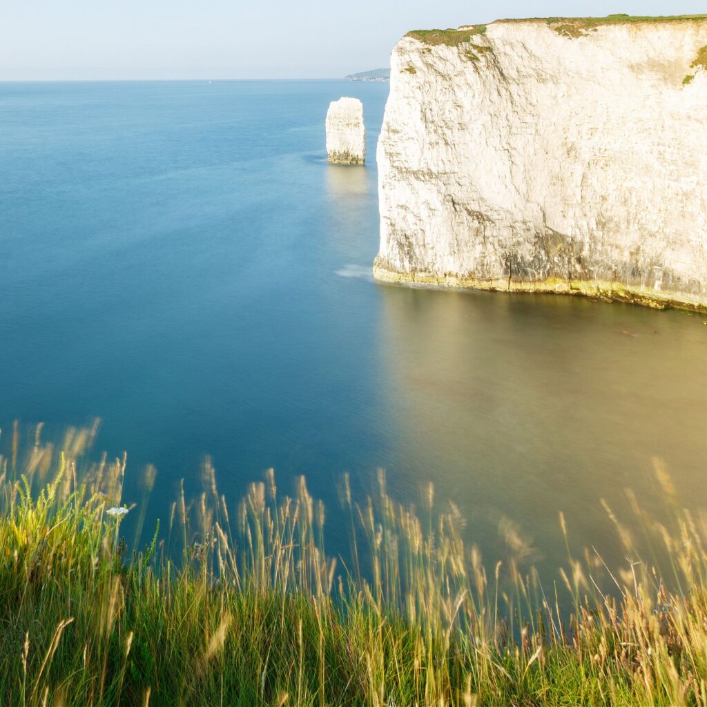 Soft morning light at Old Harry Rocks, at Handfast Point on the Isle of Purbeck, Jurassic Coast, Dorset, England. A UNESCO World Heritage Site