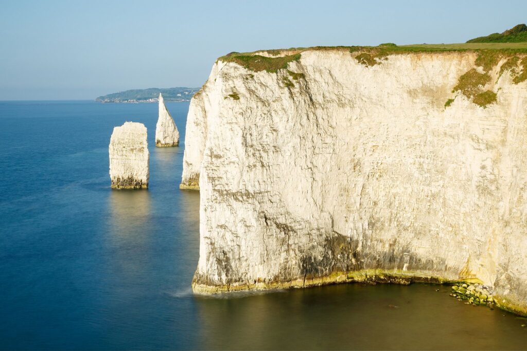 Morning light at Old Harry Rocks, at Handfast Point on the Isle of Purbeck, Jurassic Coast, Dorset, England. A UNESCO World Heritage Site