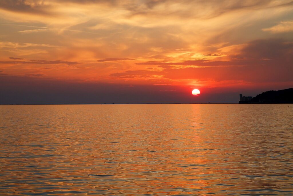 Beautiful sunset beside Miramare Castle over trieste Bay, Italy.