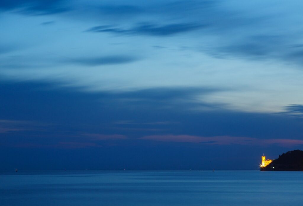 Miramare Castle at dusk, trieste Bay, Italy.