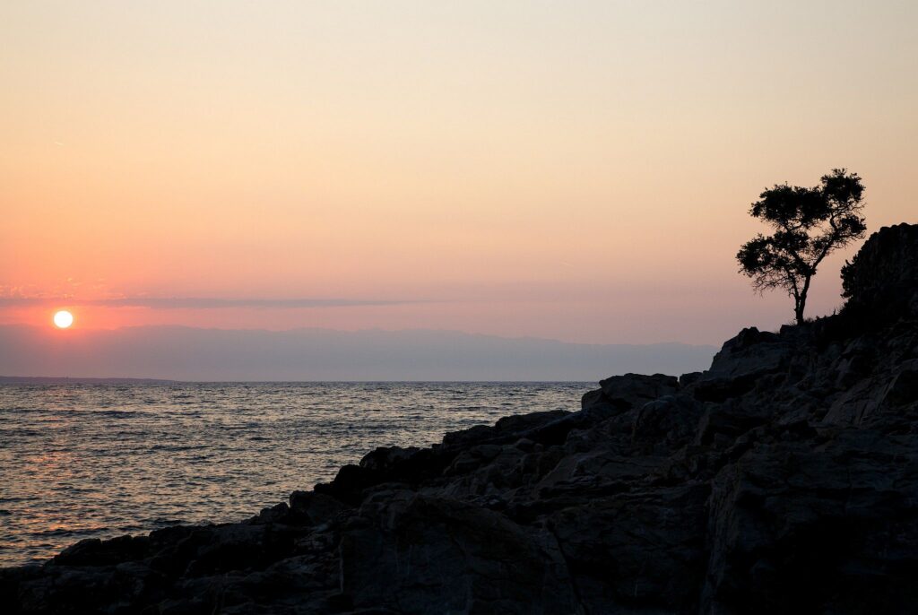 Sunrise over the rocky coastal area of Cunski. Cunski lies just 8kms north of Mali Losinj on Losinj Island, Croatia.