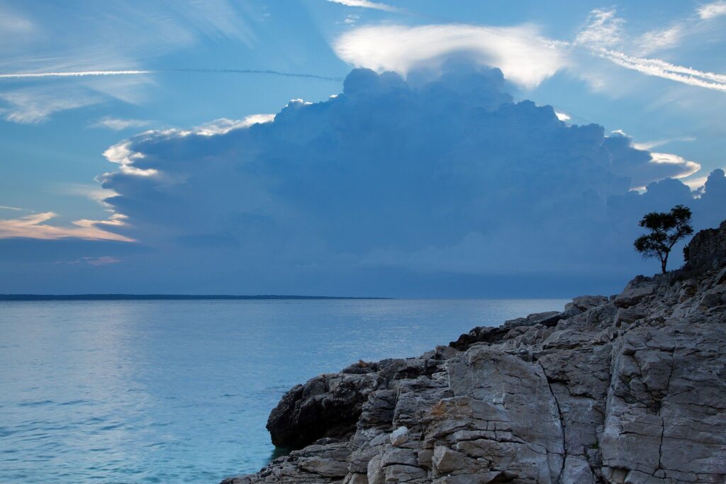 Morning light over the rocky coastal area of Cunski as the morning storm moves away. Cunski lies just 8kms north of Mali Losinj on Losinj Island, Croatia.