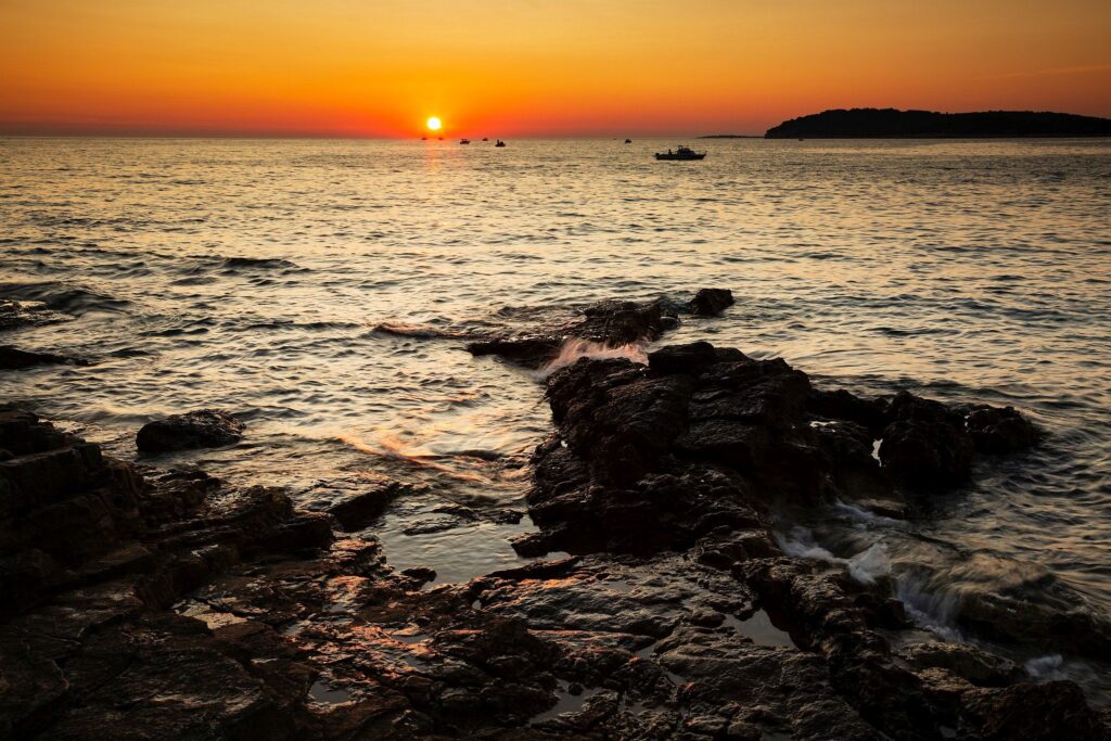 Verudela Beach, Pula, Croatia. The beautiful Istrian coastline at sunset.