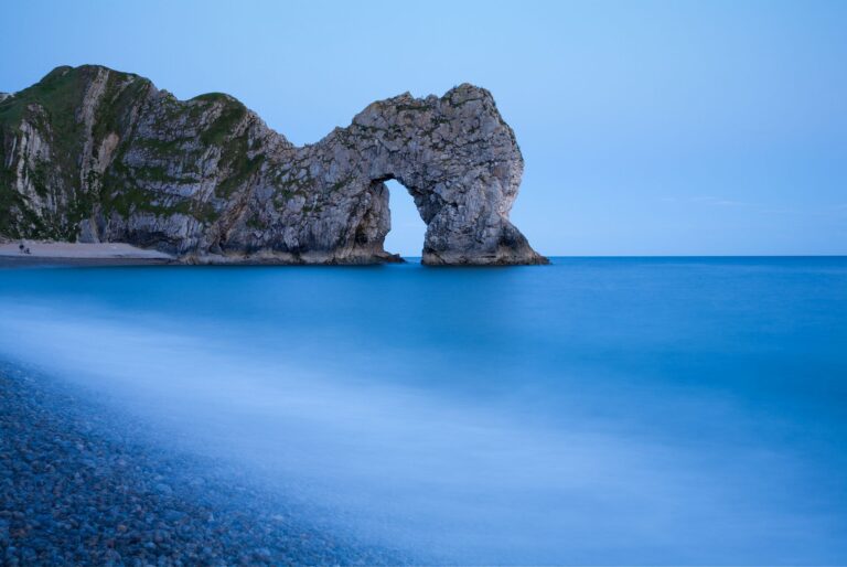 Evening view of Durdle Door beach, Dorset, England. Durdle door is one of the many stunning locations to visit on the Jurassic coast in southern England.