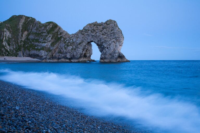 Evening view of Durdle Door beach, Dorset, England. Durdle door is one of the many stunning locations to visit on the Jurassic coast in southern England.