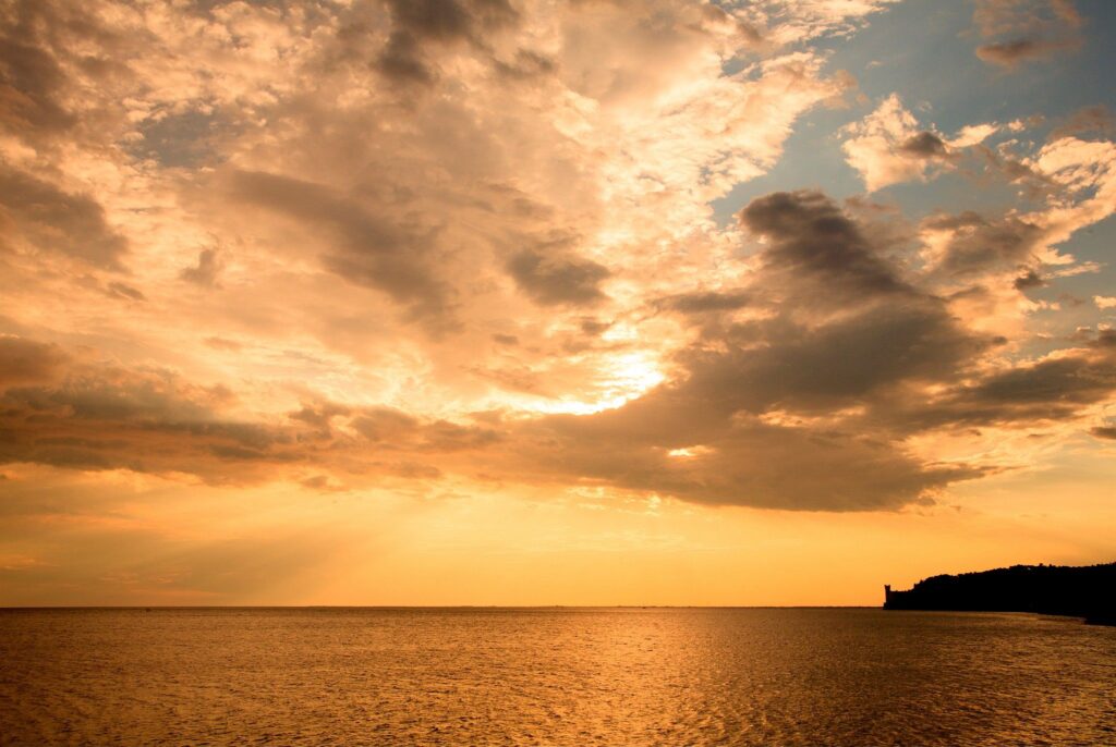 Beautiful sunset beside Miramare Castle over trieste Bay, Italy.