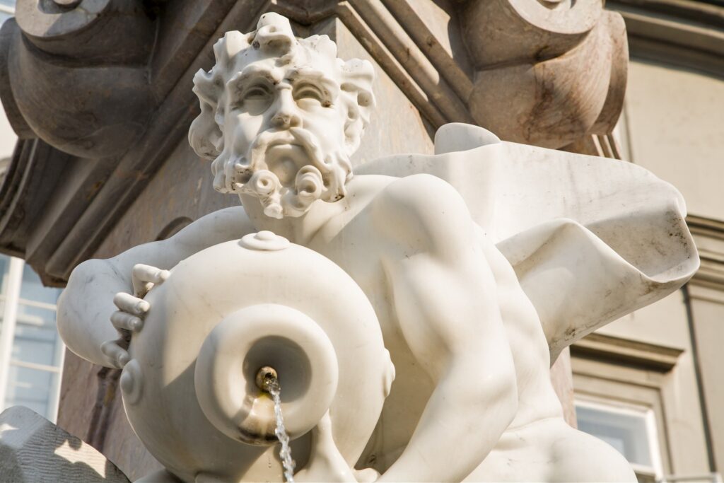 Robba Fountain, also known as the Fountain of Three Carniolan Rivers.It sits in the old town square (Mestni Trg) in front of the town hall. Built in 1751, this famous fountain is named after its creator, the Italian Baroque sculptor Francesco Robba (1698-1757). The pool is in the shape of a three leaf clover and from it rises a three sided obilisk. The fountain is adorned with the statues of the three river Gods: Krka, Ljubljanica and Sava, also the names of three of Slovenia&#039;s main rivers. The original has been removed and placed in a museum for protection, due to its fragile nature, and has been replaced with a replica.