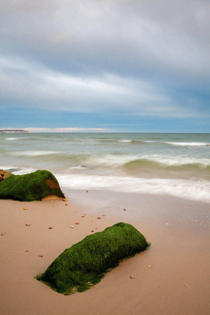 The beautiful coastal landscape at Highcliffe Beach in Dorset.