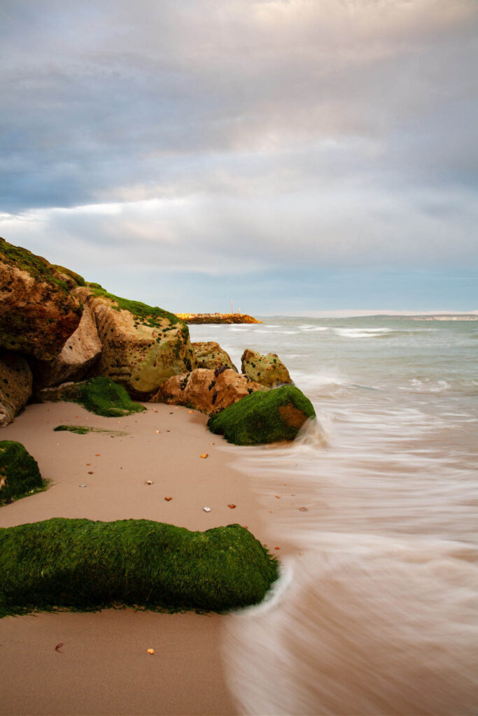 The beautiful coastal landscape at Highcliffe Beach in Dorset.