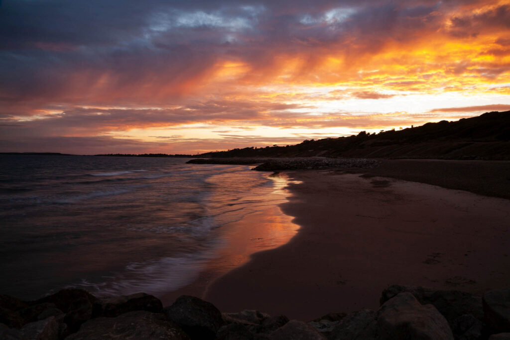 The beautiful coastal landscape at Highcliffe Beach in Dorset.