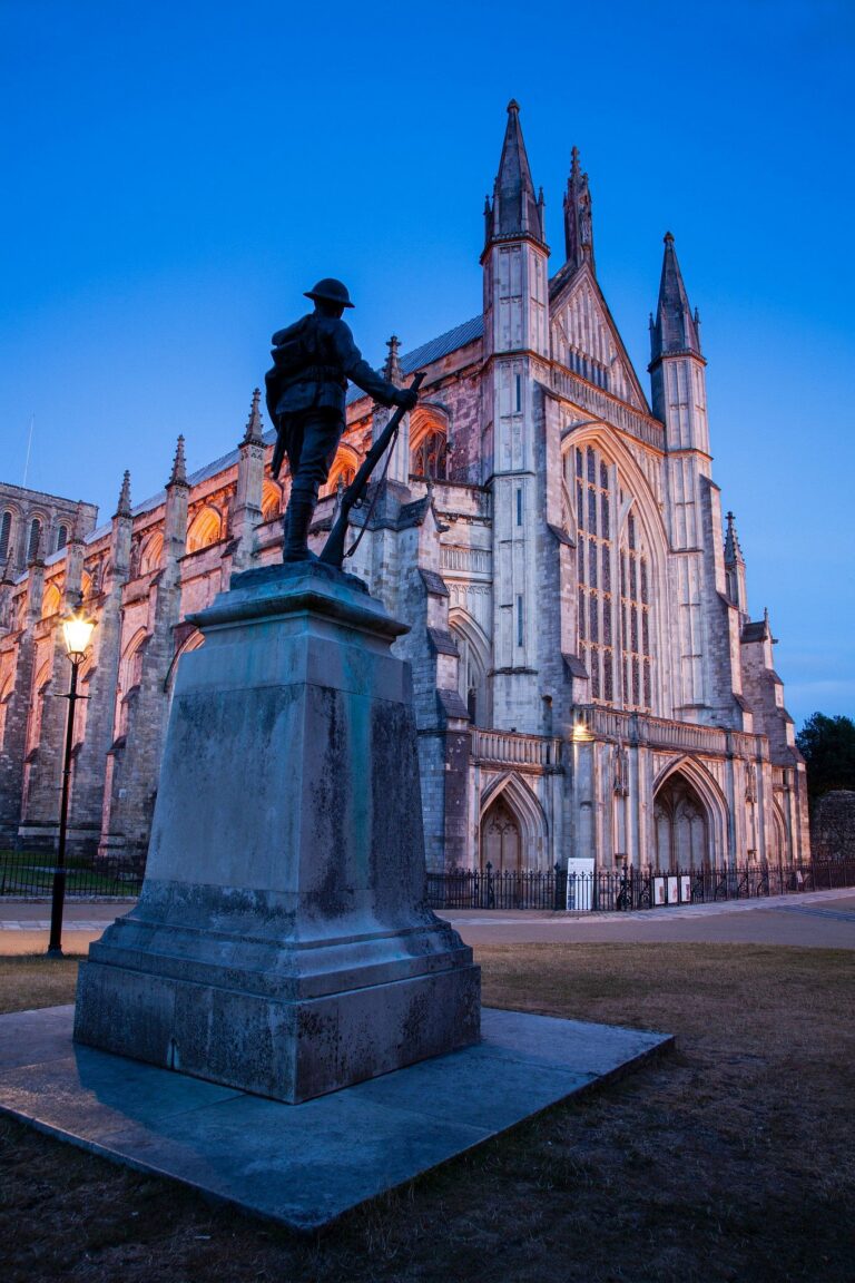 Winchester Cathedral at dusk, Hampshire, England. Winchester is the ancient capital of England.
