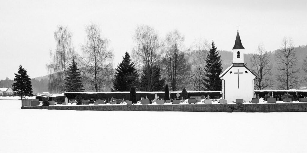 Winter view of a little chapel in