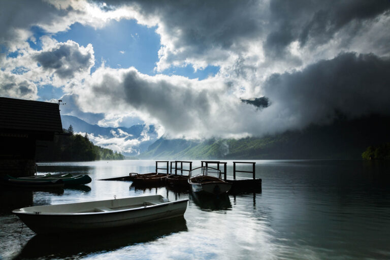 Beautiful light and clouds scattering over Bohinj Lake after a massive storm blew over the Bohinj valley, Triglav National Park, Slovenia.