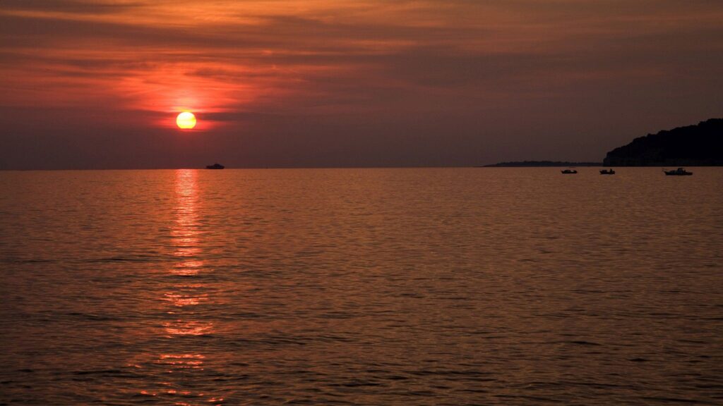 Verudela Beach, Pula, Croatia. The beautiful Istrian coastline and view from behind the Hotel Brioni at sunset.