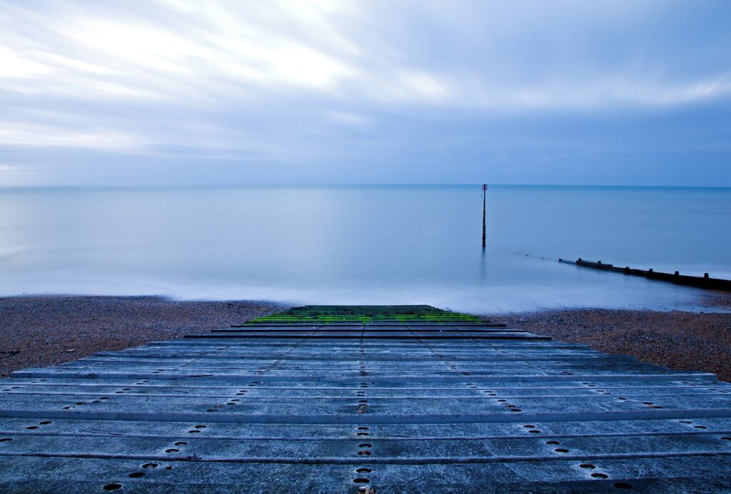 Dawn breaks at Kingsdown beach, near the famous White Cliffs of Dover, Kent, England