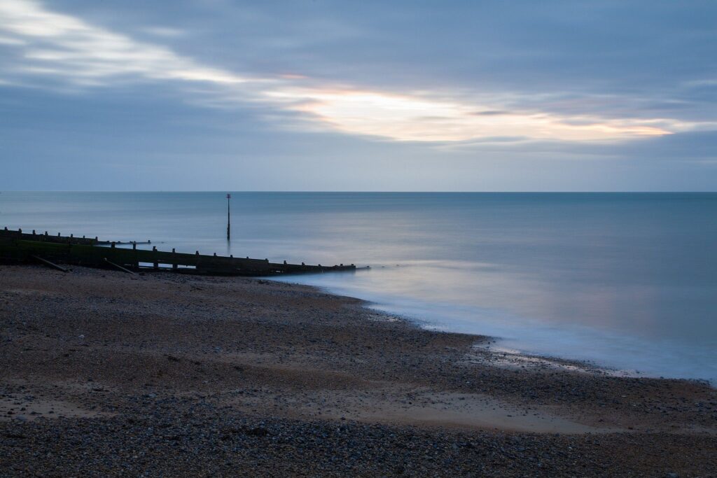 Dawn breaks at Kingsdown beach, near the famous White Cliffs of Dover, Kent, England