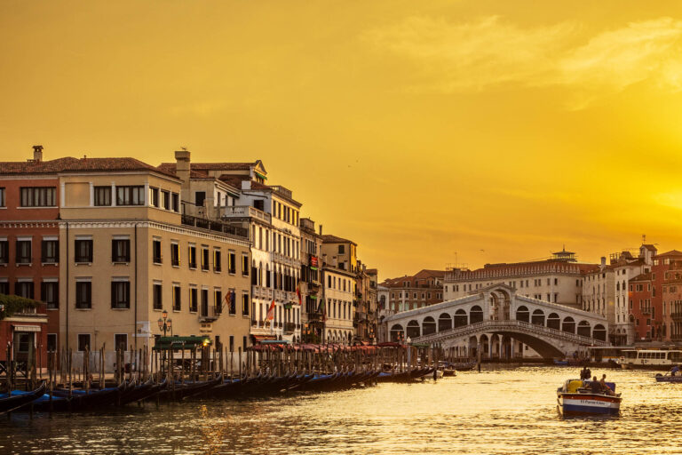 Sunrise over Rialto in Venice, Italy.