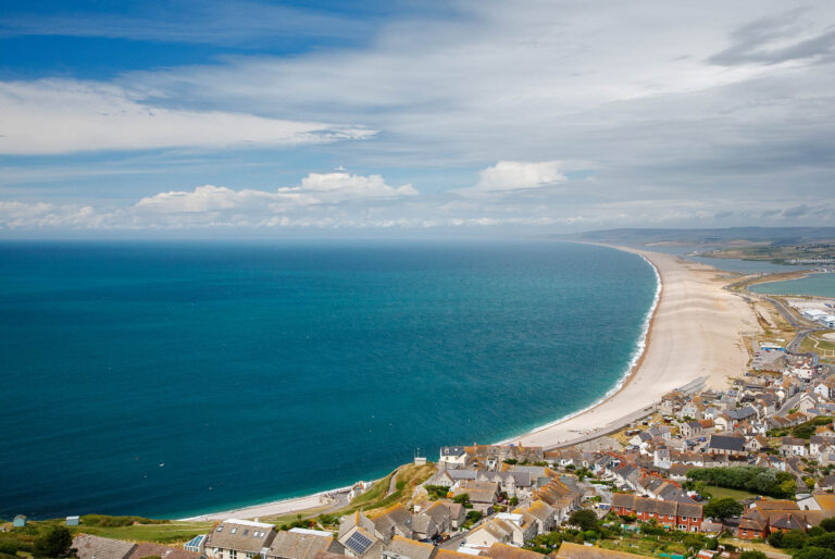 View across Portland, Chesil Beach & Weymouth harbour, Jurassic Coast, Dorset, England.