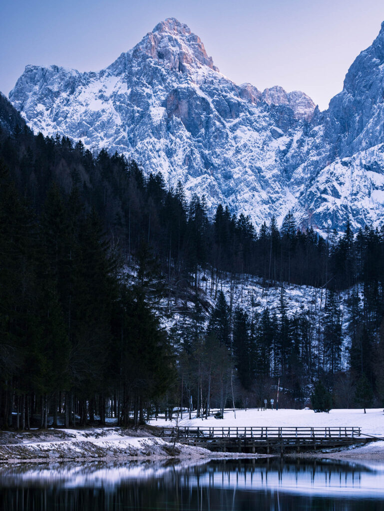 The Julian Alps seen across Lake Jasna in winter, near Kranjska Gora, Slovenia
