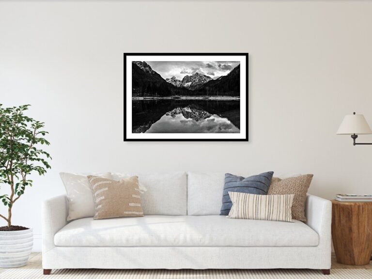 Black and white image of the Julian Alps seen across Lake Jasna in winter, near Kranjska Gora, Slovenia