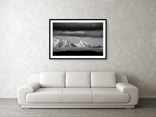 Black and white picture of mountains and clouds as a framed print.
